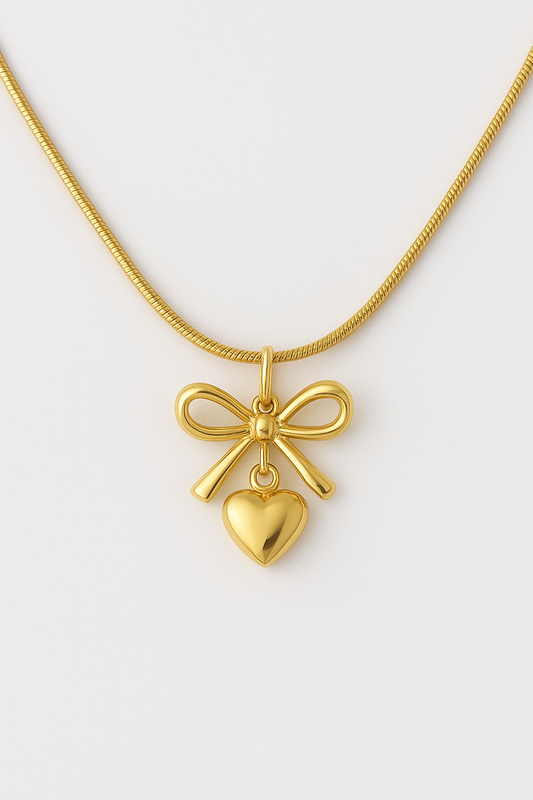 Femmora Elegant Bow & Heart Pendant Gold-Toned Necklace